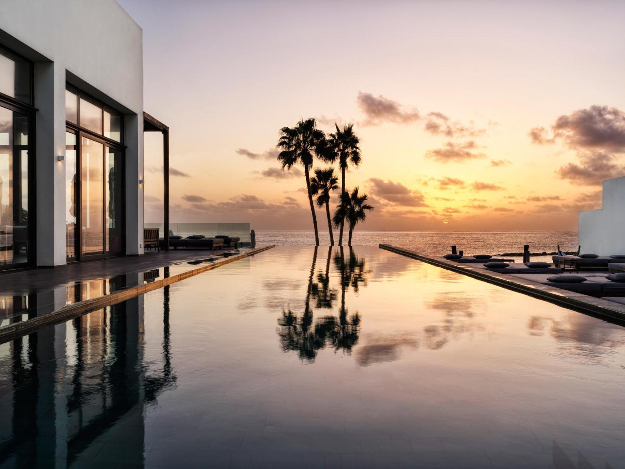 奥尔迈拉酒店 Paphos 外观 照片 Sunset at the St Regis Maldives